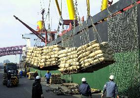 Japan begins loading rice for shipment to N. Korea